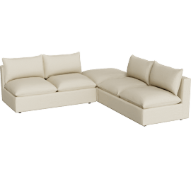 Perspective view of Lotus Modular 3-Piece L-Shaped Armless Sectional Sofa with Ottoman